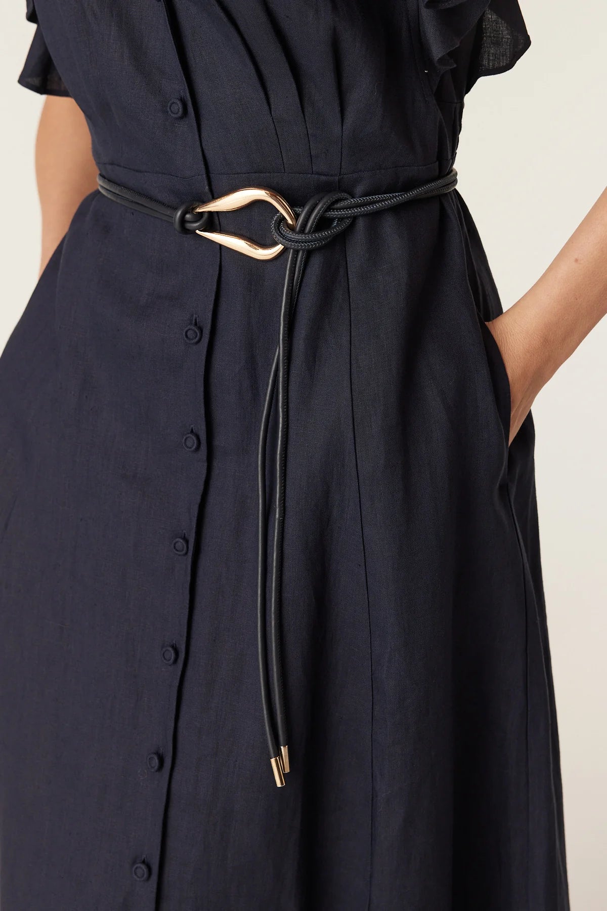 Cable tie belt with sculptural gold buckle