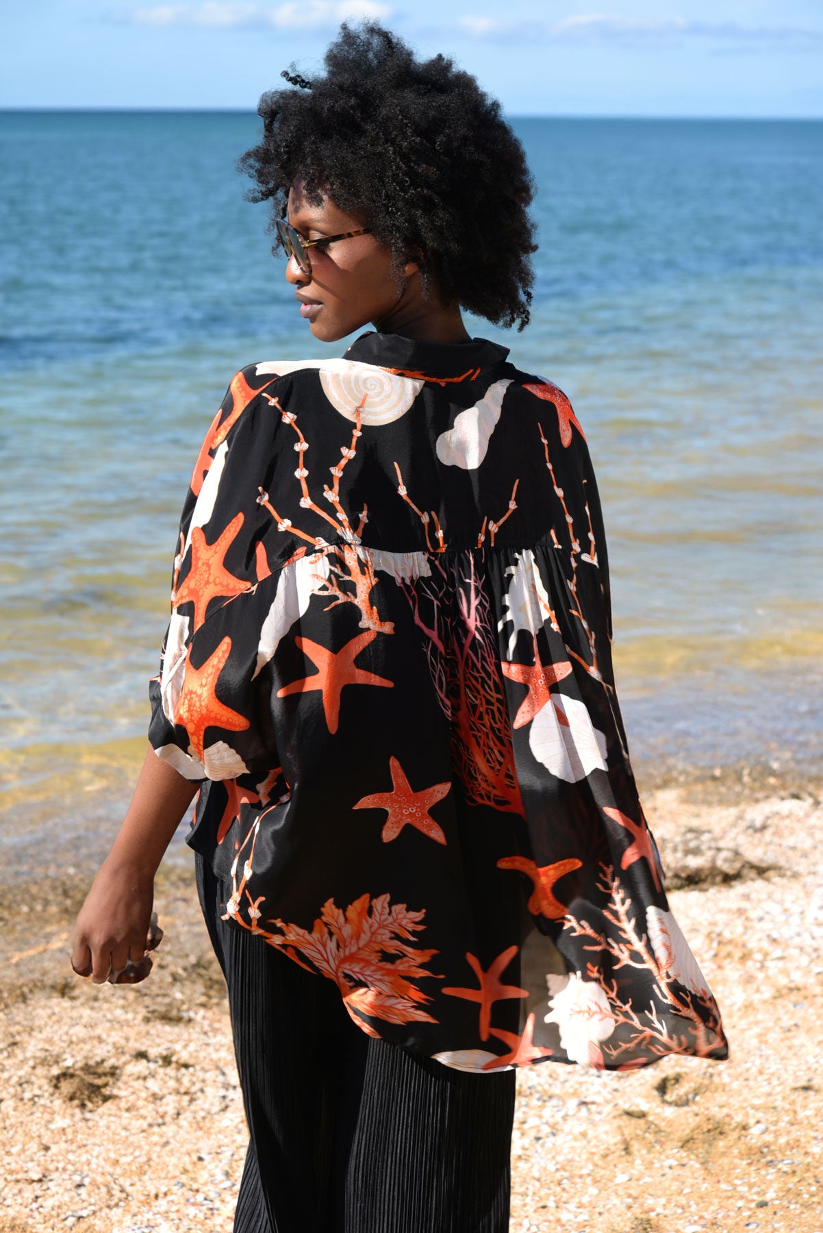 BEHIND HER BACK SHIRT