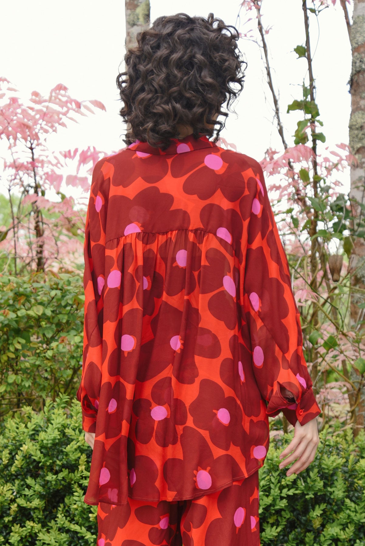 BEHIND HER BACK SHIRT