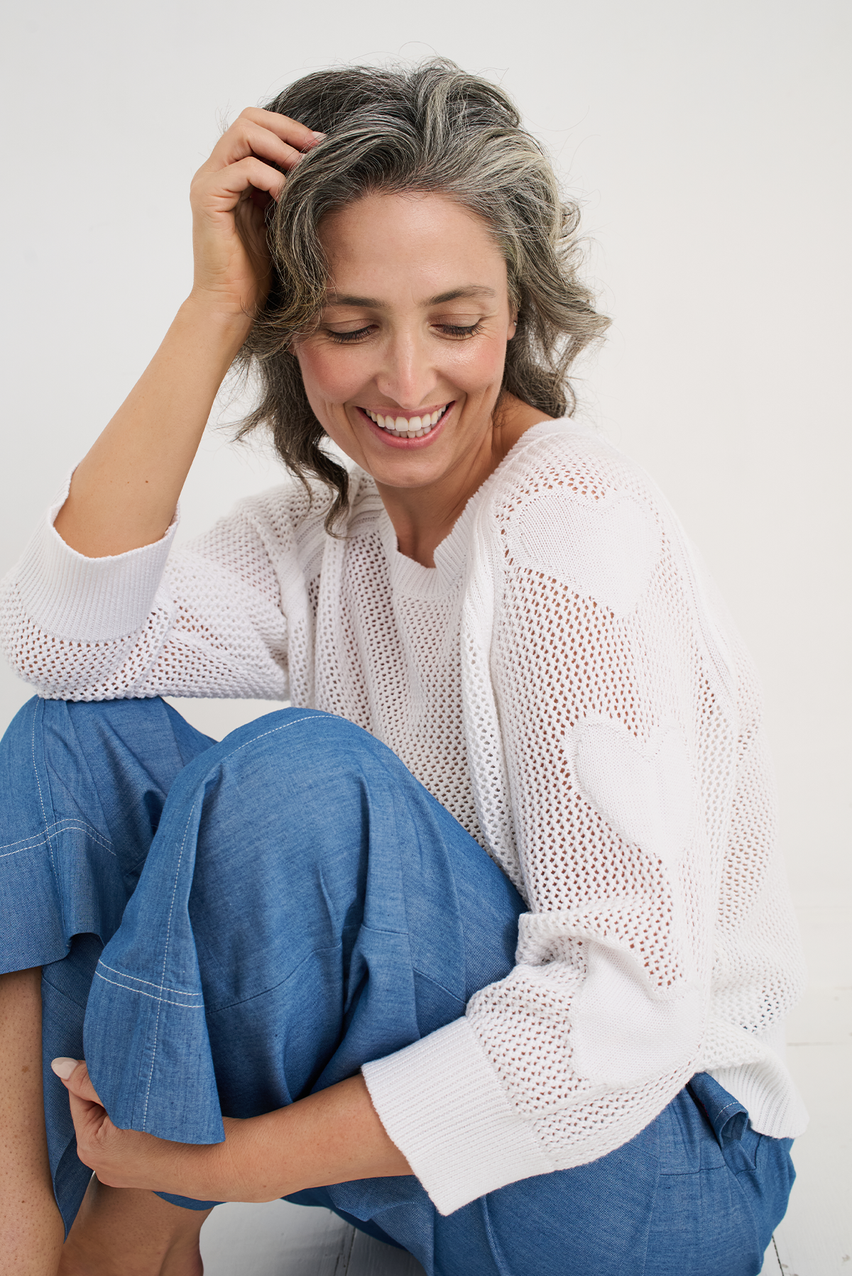 HEARTS ON MY SLEEVE SWEATER