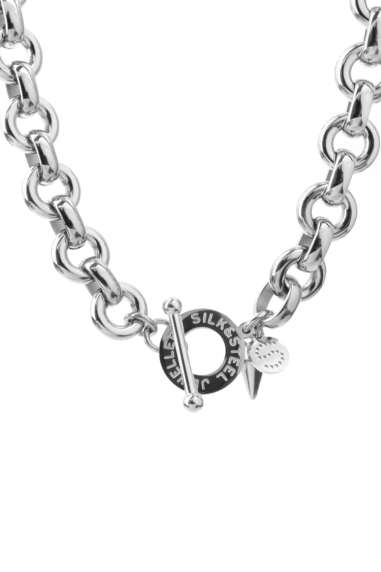 SILK AND STEEL HEIRLOOM NECKLACE SILVER NECKLACE CHUNKY CHAIN LINK CHAIN CHAIN NECKLACE TOGGLE CLASP T BAR CLASP STATEMENT NECKLACE LAYERING NECKLACE CHARM NECKLACE SILVER JEWELLERY SILVER CHAIN HEART CHARM SPIKE CHARM DISC CHARM CHUNKY JEWELLERY BOLD JEWELLERY MODERN JEWELLERY CONTEMPORARY STYLE EVERYDAY JEWELLERY LUXE STYLE MINIMAL STYLE TREND JEWELLERY WOMENS JEWELLERY LAYERING PIECE GIFT IDEA STAINLESS STEEL POLISHED FINISH PREMIUM JEWELLERY FASHION JEWELLERY SILVER ACCESSORIES