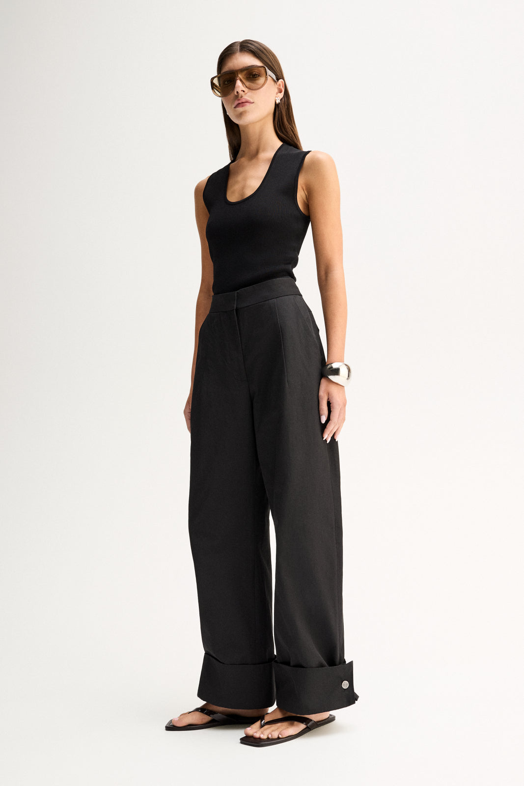 ELKA COLLECTIVE EVERETT PANT BLACK PANTS WIDE LEG PANTS TAILORED PANTS HIGH WAIST TROUSERS BLACK TROUSERS WIDE LEG TROUSERS PALAZZO PANTS SMART TROUSERS TAILORED FIT MINIMAL STYLE MODERN STYLE CONTEMPORARY FASHION ELEVATED BASICS EVERYDAY STYLE SMART CASUAL WORKWEAR WOMENS PANTS WOMENS TROUSERS BLACK CLOTHING RELAXED FIT PREMIUM QUALITY LUXE STYLE CLASSIC STYLE WARDROBE STAPLE OFFICE STYLE RESORT WEAR FULL LENGTH PANTS TURN UP HEM CHIC STYLE