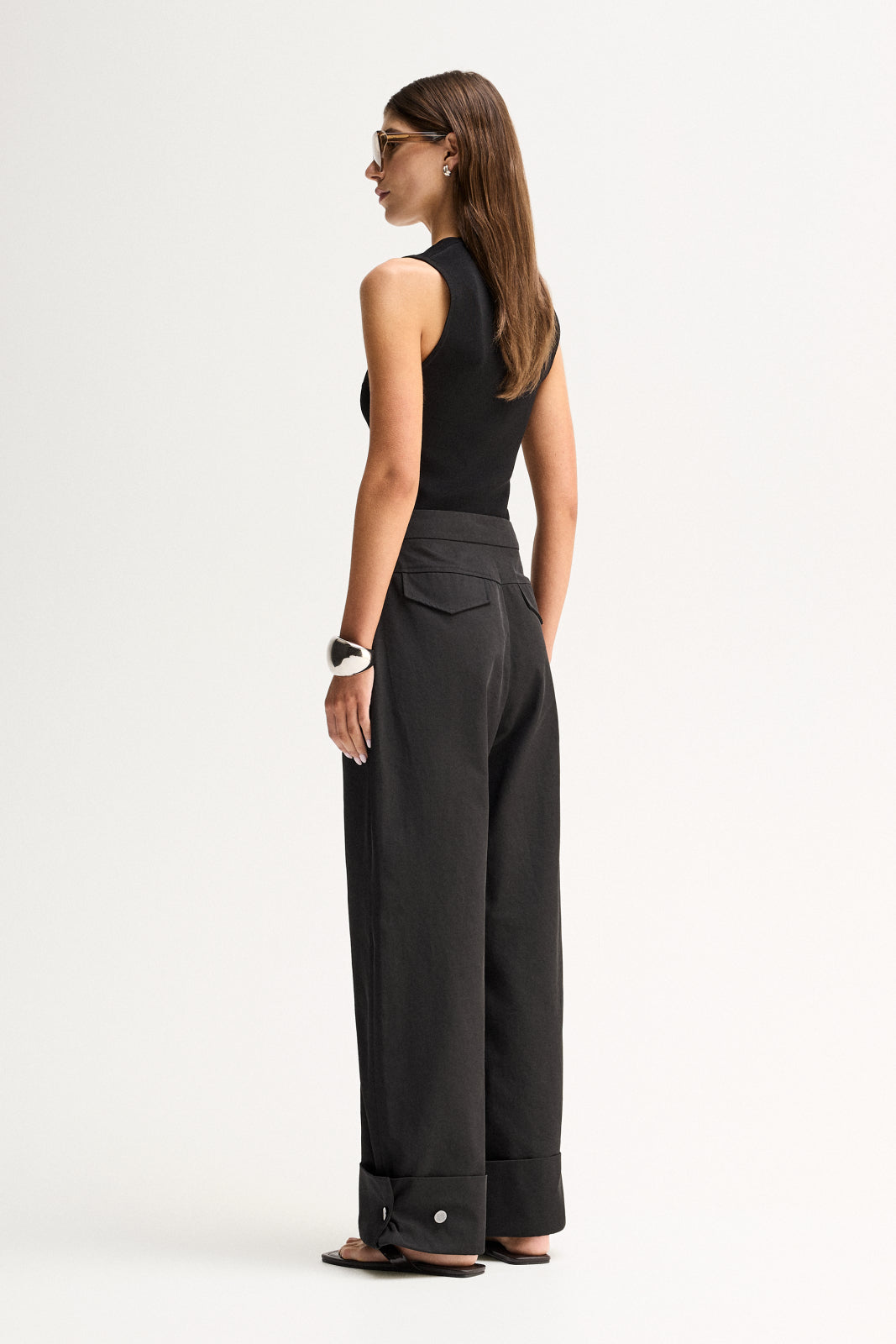 ELKA COLLECTIVE EVERETT PANT BLACK PANTS WIDE LEG PANTS TAILORED PANTS HIGH WAIST TROUSERS BLACK TROUSERS WIDE LEG TROUSERS PALAZZO PANTS SMART TROUSERS TAILORED FIT MINIMAL STYLE MODERN STYLE CONTEMPORARY FASHION ELEVATED BASICS EVERYDAY STYLE SMART CASUAL WORKWEAR WOMENS PANTS WOMENS TROUSERS BLACK CLOTHING RELAXED FIT PREMIUM QUALITY LUXE STYLE CLASSIC STYLE WARDROBE STAPLE OFFICE STYLE RESORT WEAR FULL LENGTH PANTS TURN UP HEM CHIC STYLE