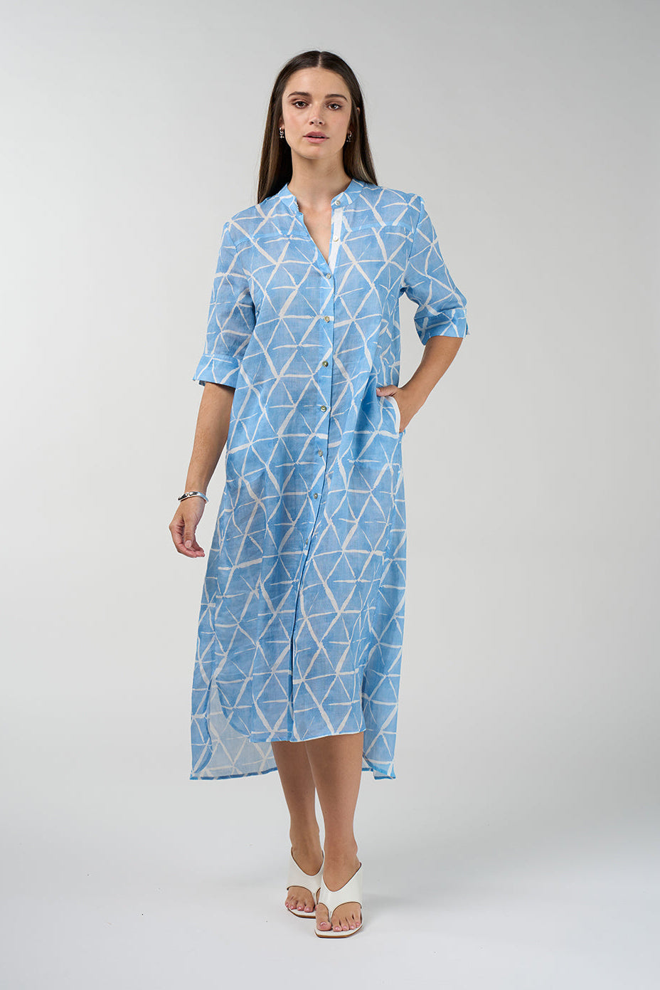 Prism Shirt Dress in sky blue and white geometric print with button front and midi length