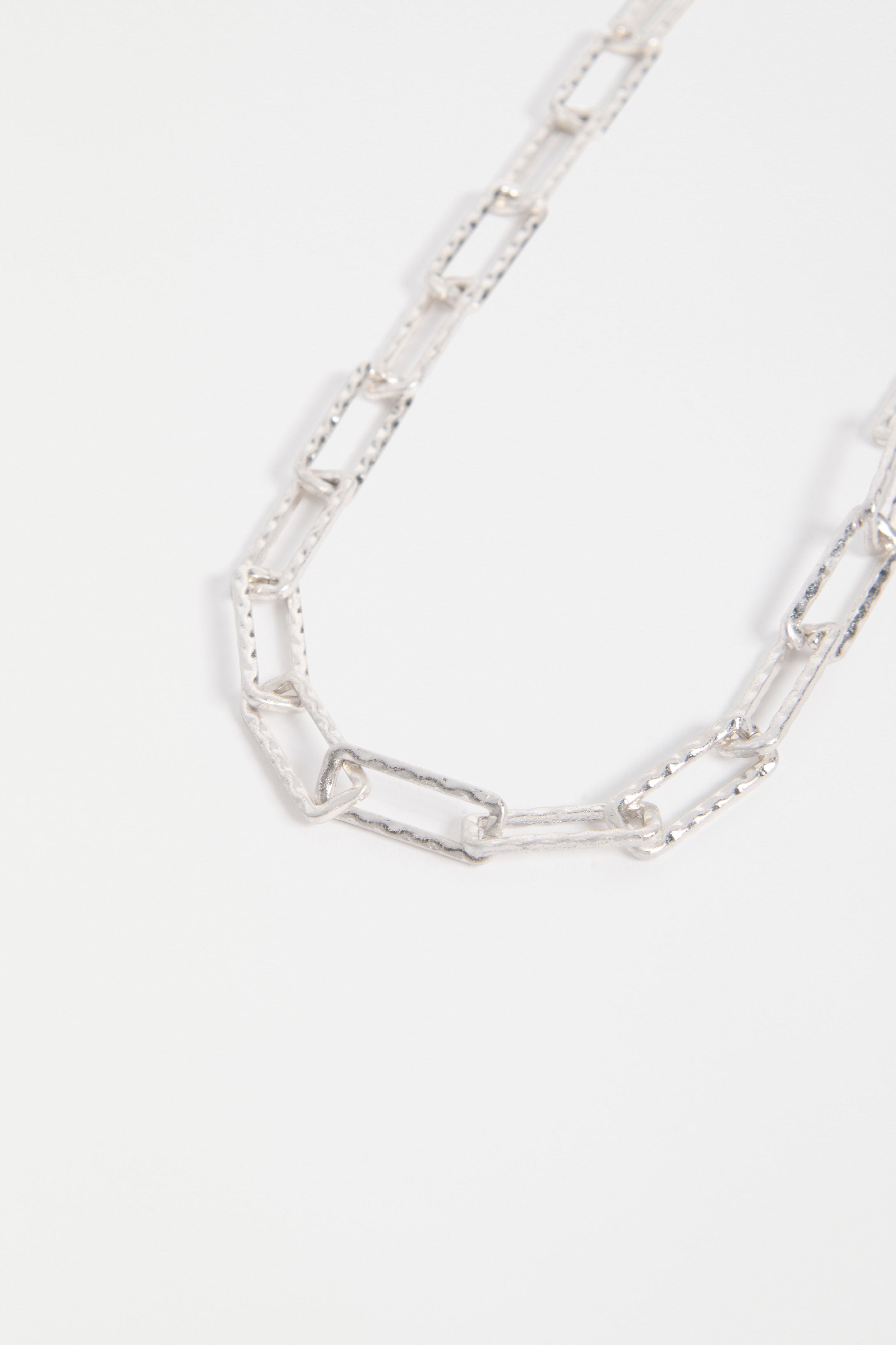 RINGVA NECKLACE Silver chain necklace on a white background