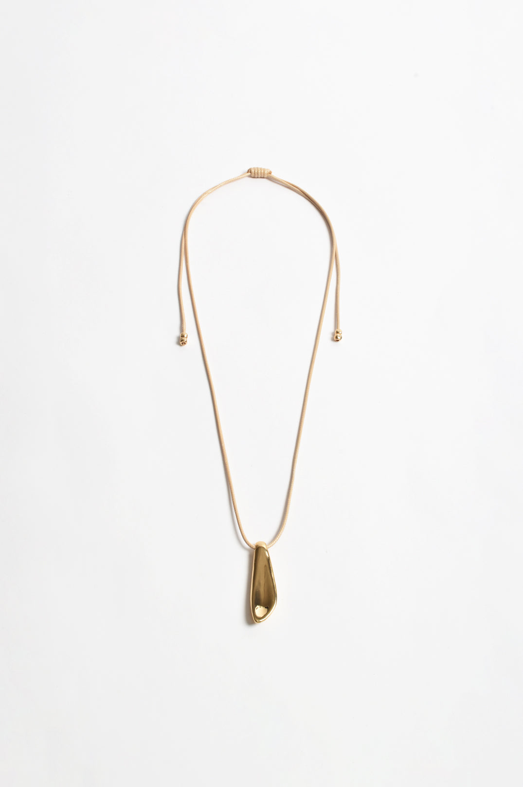 ADORNE METAL POD CORD NECKLACE GOLD
