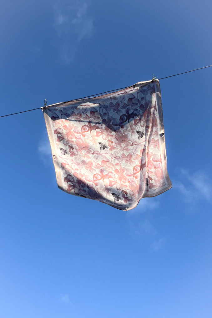 WENDYS SCARF SILK FEEL POLYESTER WHITE BASE WITH PINK AND BLACK FINE LINE FLORAL DETAILING AND TAUPE BOARDER