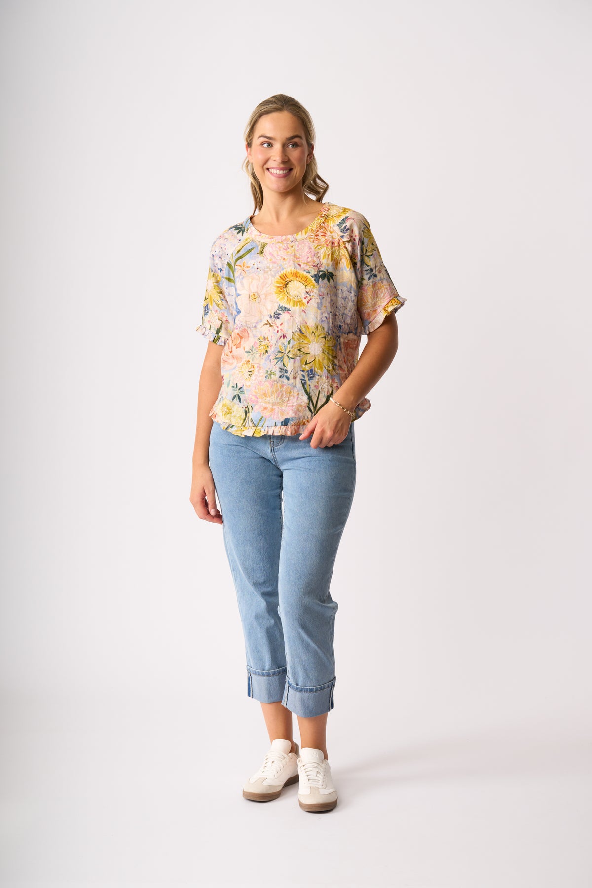 RUFFLES AND SCOOP HEM TOP