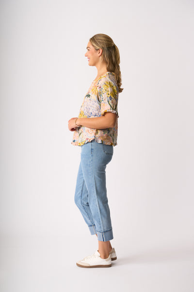 RUFFLES AND SCOOP HEM TOP