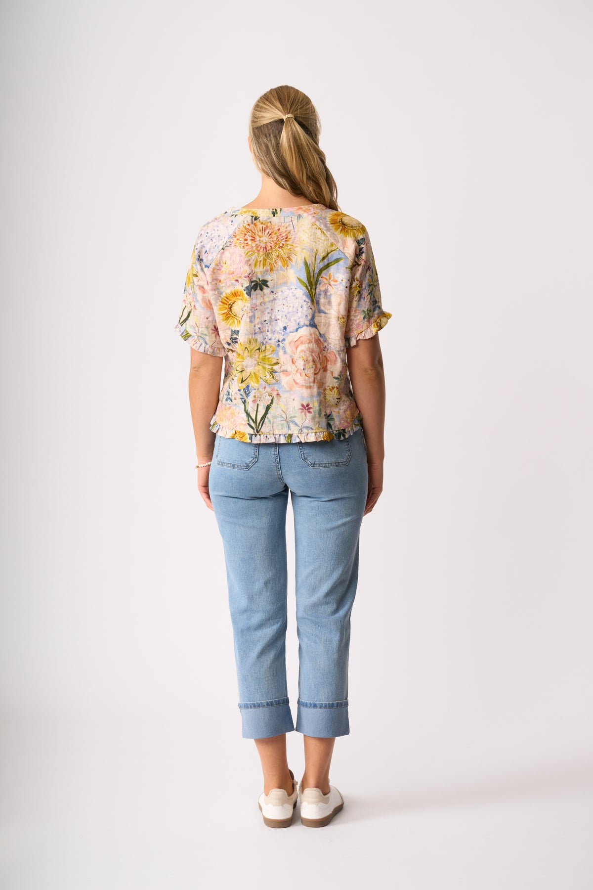 RUFFLES AND SCOOP HEM TOP