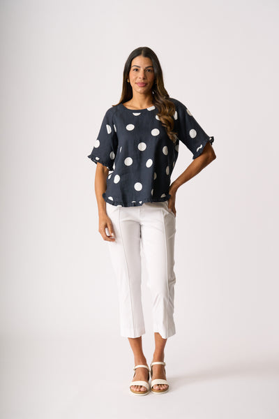 RUFFLES AND SCOOP HEM TOP