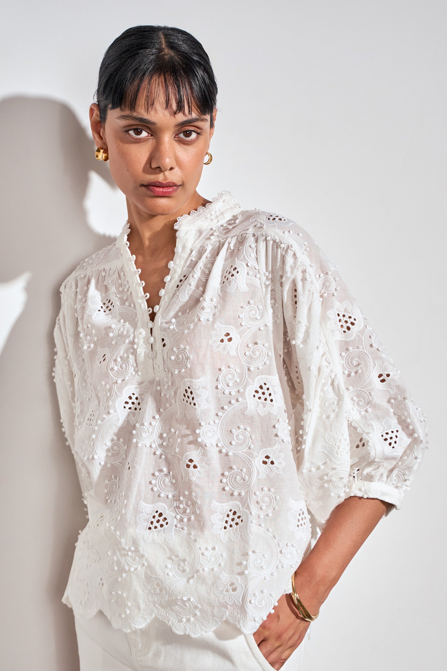 ZOE KRATSMANN TWINE TOP WHITE TOP WITH FLORAL EMBROIDERY SUBTLE PUFF 3/4 SLEEVES AND A BUTTON V NECK