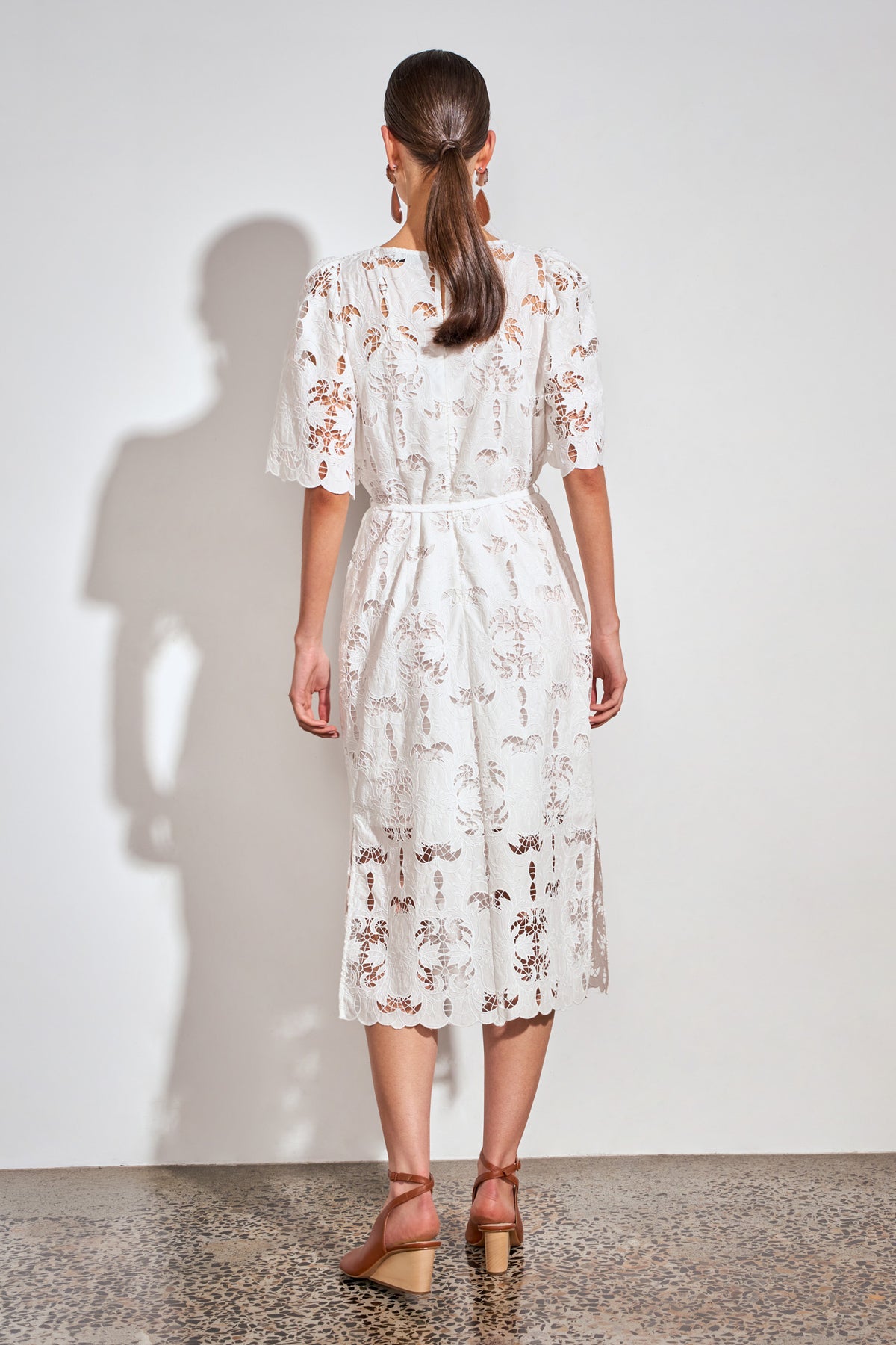 ZOE KRATZMANN GUIDE DRESS ALABASTER - A white midi dress with eyelet embroidery detail and puff sleeves.