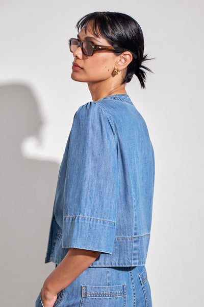 ZOE KRATSMANN PLUNGE JACKET DOUBLE BREASTED COLLARLESS DENIM JACKET WITH 3/4 LENGTH SLEEVES AND BRASS BUTTONS 