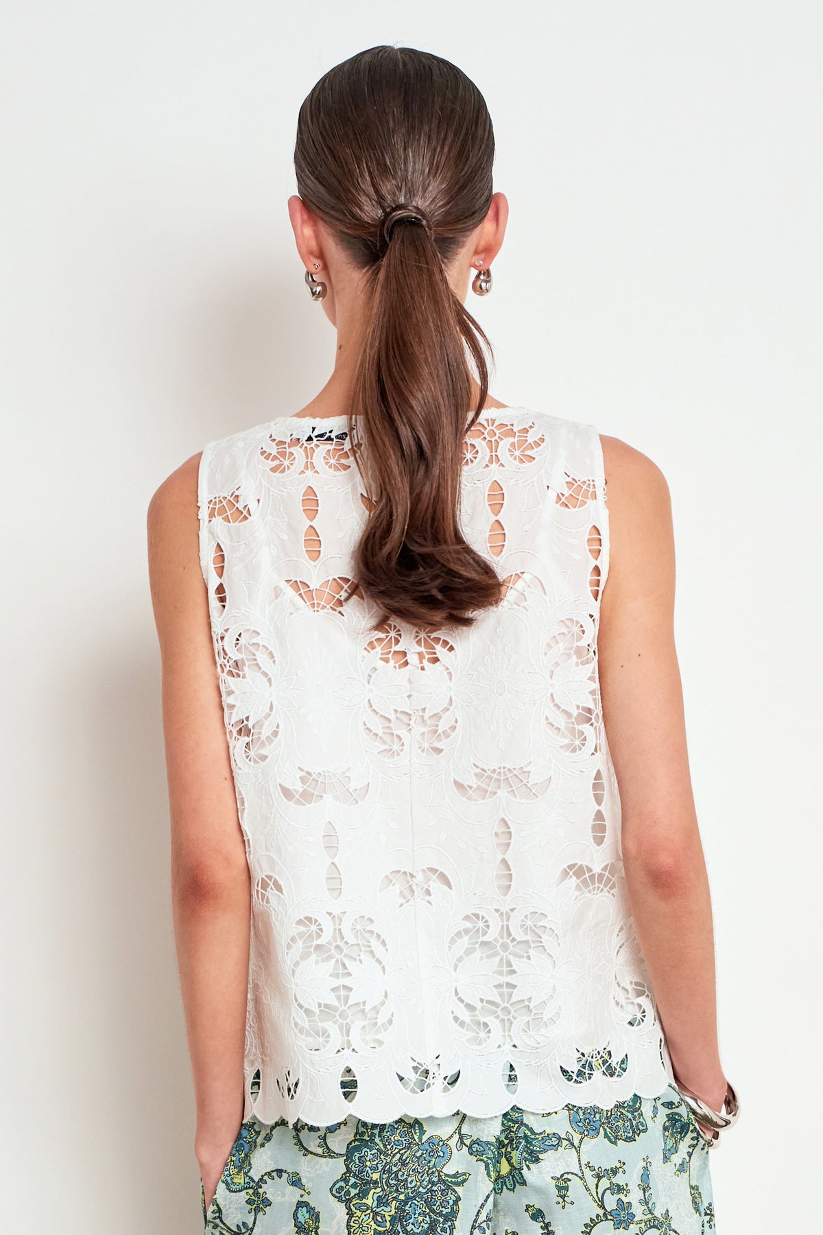 ZOE KRATZMANN GARNER TOP ALABASTER  - A sleeveless white lace top with a scalloped hem and sheer flutter sleeves
