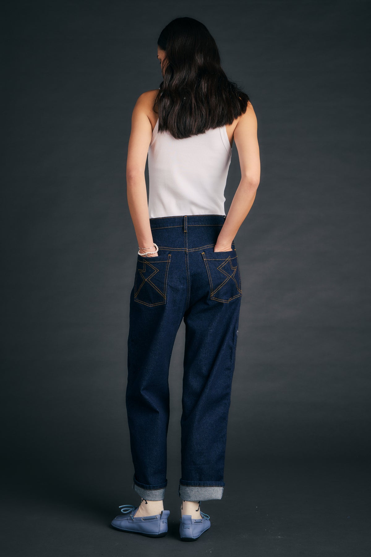 KAREN WALKER MOD JEANS OUTLAND DENIM DARK WASH DENIM WITH CONTRAST STITCHING AND BACK POCKET STITCH DETAILING