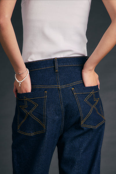 KAREN WALKER MOD JEANS OUTLAND DENIM DARK WASH DENIM WITH CONTRAST STITCHING AND BACK POCKET STITCH DETAILING