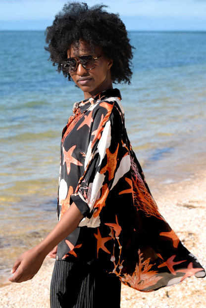 BEHIND HER BACK SHIRT