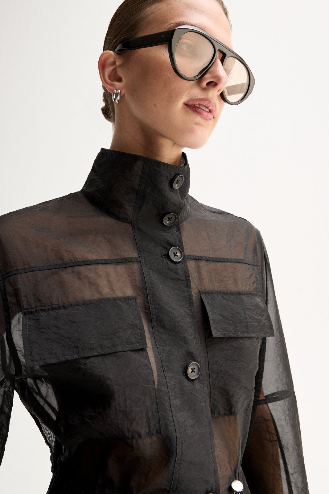 ELKA COLLECTIVE PERRI SHIRT BLACK SHIRT SHEER SHIRT ORGANZA SHIRT SHEER BLOUSE LIGHTWEIGHT SHIRT UTILITY SHIRT BUTTON SHIRT LONG SLEEVE HIGH NECK STATEMENT SHIRT MODERN SHIRT DESIGNER STYLE CONTEMPORARY FASHION MINIMAL STYLE SMART CASUAL ELEVATED BASICS EVERYDAY STYLE LAYERING PIECE BLACK CLOTHING WOMENS SHIRT WOMENS FASHION FASHION SHIRT POCKET SHIRT DRAWSTRING WAIST SEMI SHEER OVERSIZED FIT PREMIUM QUALITY TRANSITIONAL STYLE RESORT WEAR EVENING STYLE CHIC STYLE