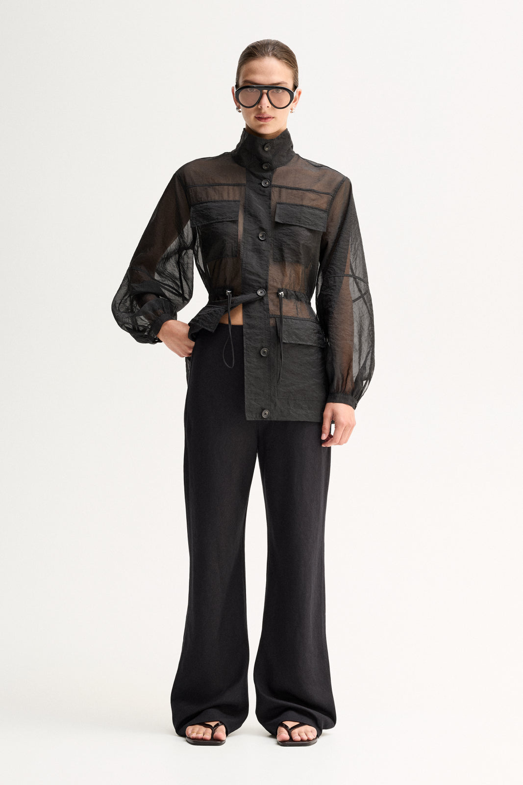 ELKA COLLECTIVE PERRI SHIRT BLACK SHIRT SHEER SHIRT ORGANZA SHIRT SHEER BLOUSE LIGHTWEIGHT SHIRT UTILITY SHIRT BUTTON SHIRT LONG SLEEVE HIGH NECK STATEMENT SHIRT MODERN SHIRT DESIGNER STYLE CONTEMPORARY FASHION MINIMAL STYLE SMART CASUAL ELEVATED BASICS EVERYDAY STYLE LAYERING PIECE BLACK CLOTHING WOMENS SHIRT WOMENS FASHION FASHION SHIRT POCKET SHIRT DRAWSTRING WAIST SEMI SHEER OVERSIZED FIT PREMIUM QUALITY TRANSITIONAL STYLE RESORT WEAR EVENING STYLE CHIC STYLE