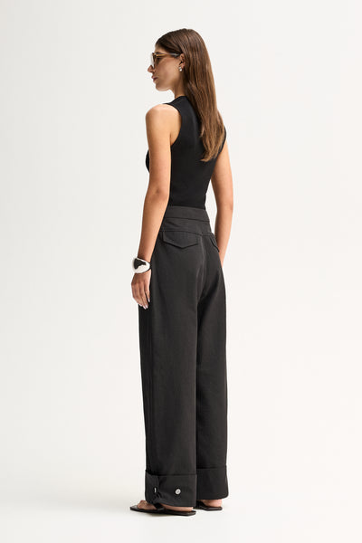 ELKA COLLECTIVE EVERETT PANT BLACK PANTS WIDE LEG PANTS TAILORED PANTS HIGH WAIST TROUSERS BLACK TROUSERS WIDE LEG TROUSERS PALAZZO PANTS SMART TROUSERS TAILORED FIT MINIMAL STYLE MODERN STYLE CONTEMPORARY FASHION ELEVATED BASICS EVERYDAY STYLE SMART CASUAL WORKWEAR WOMENS PANTS WOMENS TROUSERS BLACK CLOTHING RELAXED FIT PREMIUM QUALITY LUXE STYLE CLASSIC STYLE WARDROBE STAPLE OFFICE STYLE RESORT WEAR FULL LENGTH PANTS TURN UP HEM CHIC STYLE