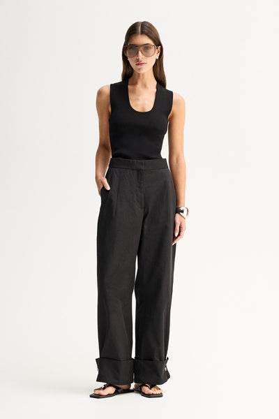 ELKA COLLECTIVE EVERETT PANT BLACK PANTS WIDE LEG PANTS TAILORED PANTS HIGH WAIST TROUSERS BLACK TROUSERS WIDE LEG TROUSERS PALAZZO PANTS SMART TROUSERS TAILORED FIT MINIMAL STYLE MODERN STYLE CONTEMPORARY FASHION ELEVATED BASICS EVERYDAY STYLE SMART CASUAL WORKWEAR WOMENS PANTS WOMENS TROUSERS BLACK CLOTHING RELAXED FIT PREMIUM QUALITY LUXE STYLE CLASSIC STYLE WARDROBE STAPLE OFFICE STYLE RESORT WEAR FULL LENGTH PANTS TURN UP HEM CHIC STYLE
