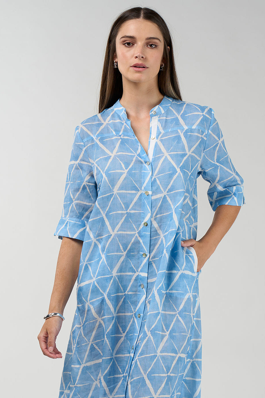 Prism Shirt Dress in sky blue and white geometric print with button front and midi length