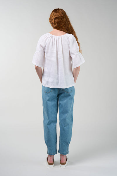 Cove linen blouse in silk white with gathered round neckline and flared sleeves