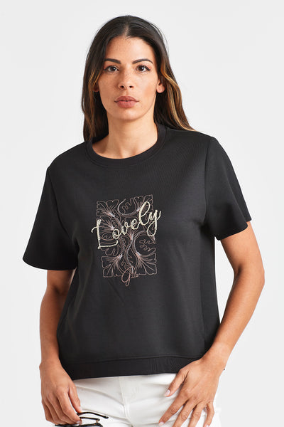 ALOYSE TEE Woman wearing a black t-shirt with 'Lovely' design on a white background