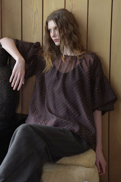 A PROBLEM SHEERED BLOUSE
