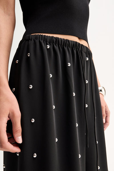 ELKA COLLECTIVE OLYMPIA PANT BLACK WIDE LEG PANTS BLACK WIDE LEG TROUSERS EMBELLISHED BLACK PANTS EMBELLISHED TROUSERS STUDDED BLACK PANTS RHINESTONE PANTS CRYSTAL EMBELLISHED TROUSERS BLACK FLOWY PANTS RELAXED FIT TROUSERS WIDE LEG TROUSERS WOMEN HIGH WAISTED BLACK PANTS ELASTICATED WAIST PANTS DRAWSTRING TROUSERS STATEMENT TROUSERS EVENING TROUSERS ELEGANT BLACK PANTS LUXURY BLACK TROUSERS WOMEN'S DESIGNER TROUSERS CONTEMPORARY WOMEN'S FASHION CHIC BLACK TROUSERS DRESSY WIDE LEG PANTS BLACK STATEMENT PANT