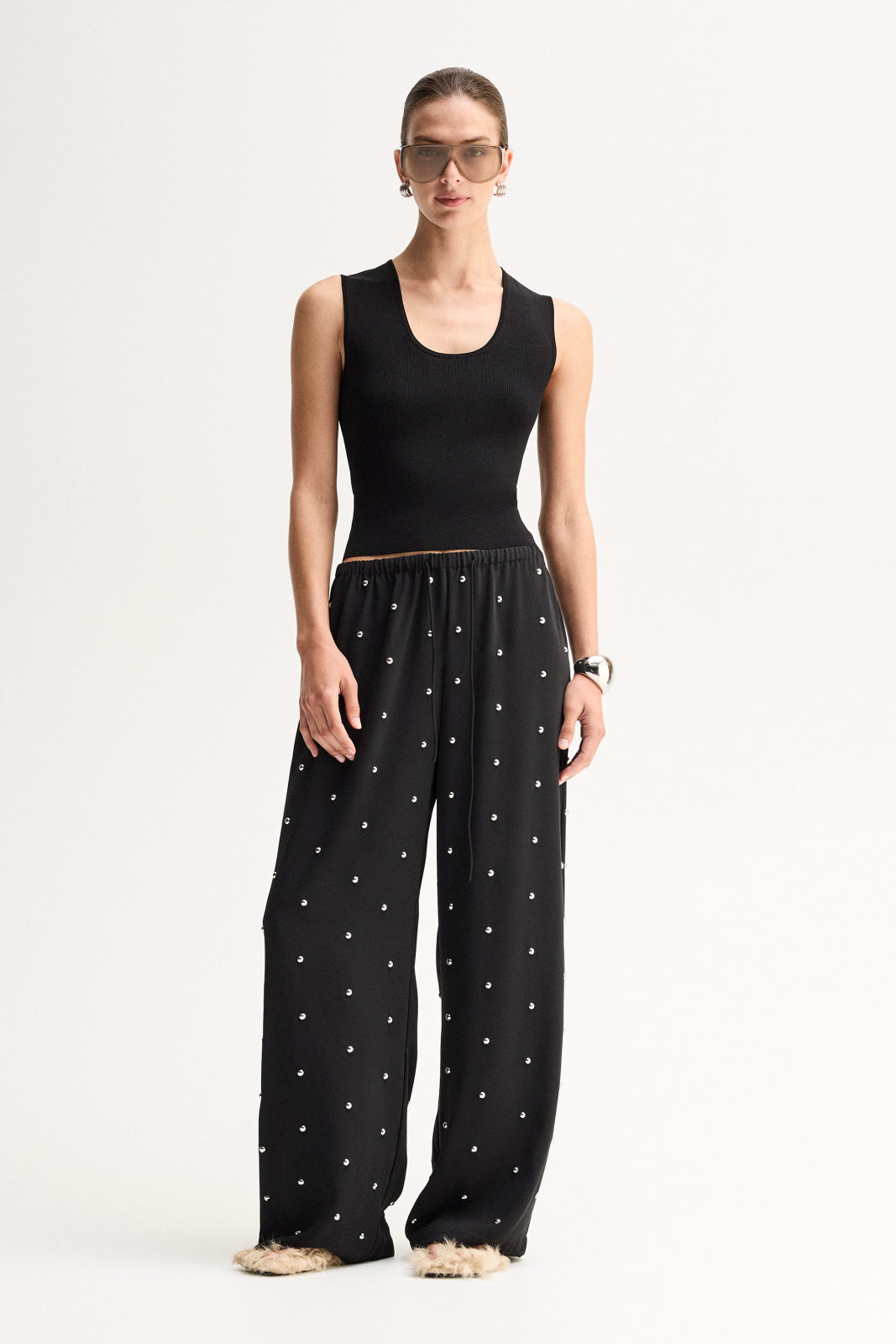 ELKA COLLECTIVE OLYMPIA PANT BLACK WIDE LEG PANTS BLACK WIDE LEG TROUSERS EMBELLISHED BLACK PANTS EMBELLISHED TROUSERS STUDDED BLACK PANTS RHINESTONE PANTS CRYSTAL EMBELLISHED TROUSERS BLACK FLOWY PANTS RELAXED FIT TROUSERS WIDE LEG TROUSERS WOMEN HIGH WAISTED BLACK PANTS ELASTICATED WAIST PANTS DRAWSTRING TROUSERS STATEMENT TROUSERS EVENING TROUSERS ELEGANT BLACK PANTS LUXURY BLACK TROUSERS WOMEN'S DESIGNER TROUSERS CONTEMPORARY WOMEN'S FASHION CHIC BLACK TROUSERS DRESSY WIDE LEG PANTS BLACK STATEMENT PANT