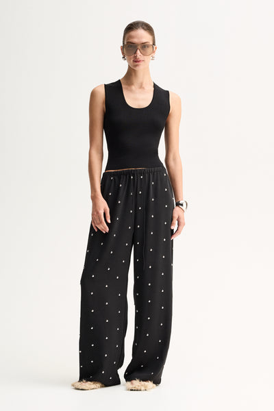 ELKA COLLECTIVE OLYMPIA PANT BLACK WIDE LEG PANTS BLACK WIDE LEG TROUSERS EMBELLISHED BLACK PANTS EMBELLISHED TROUSERS STUDDED BLACK PANTS RHINESTONE PANTS CRYSTAL EMBELLISHED TROUSERS BLACK FLOWY PANTS RELAXED FIT TROUSERS WIDE LEG TROUSERS WOMEN HIGH WAISTED BLACK PANTS ELASTICATED WAIST PANTS DRAWSTRING TROUSERS STATEMENT TROUSERS EVENING TROUSERS ELEGANT BLACK PANTS LUXURY BLACK TROUSERS WOMEN'S DESIGNER TROUSERS CONTEMPORARY WOMEN'S FASHION CHIC BLACK TROUSERS DRESSY WIDE LEG PANTS BLACK STATEMENT PANT